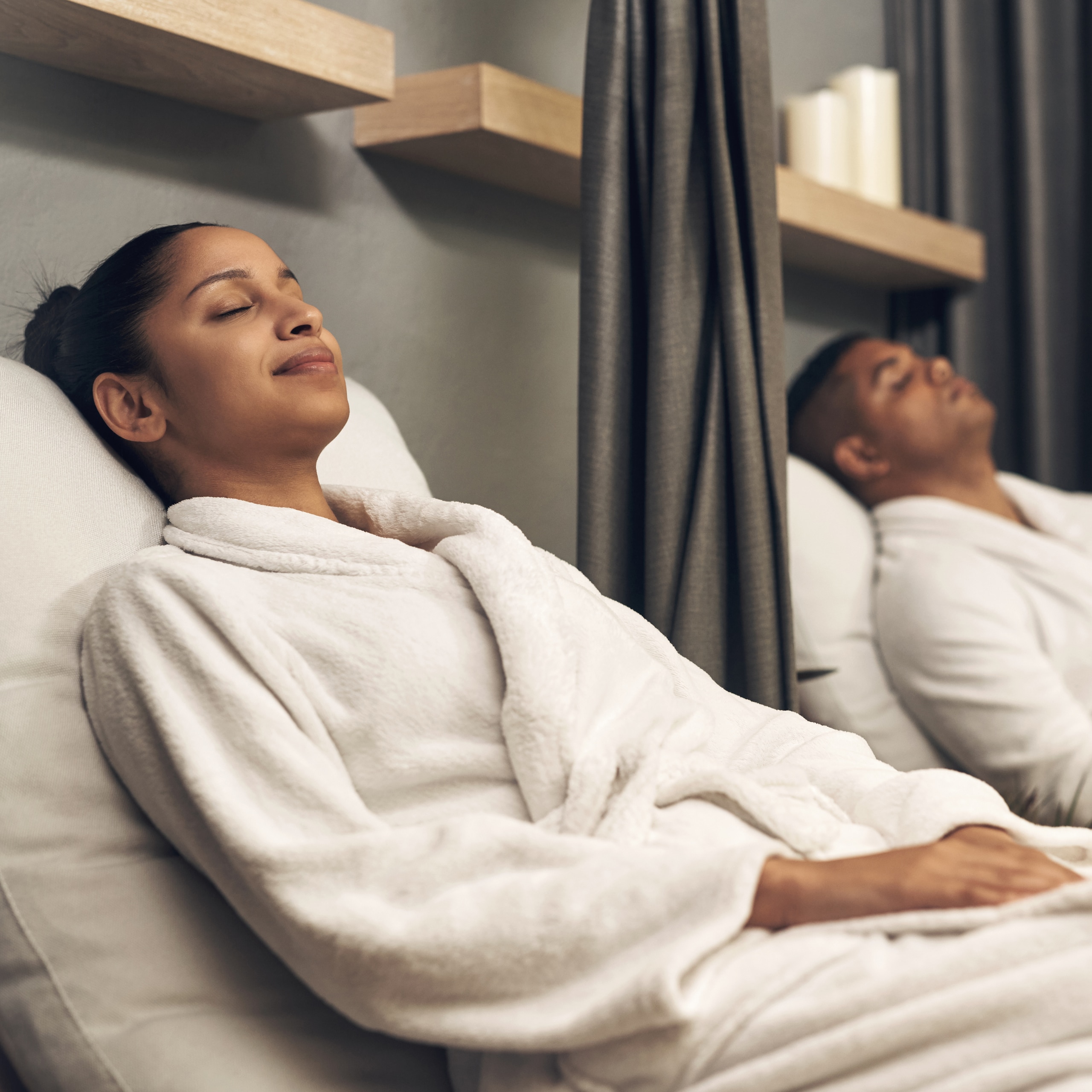A Person Lying On A Bed